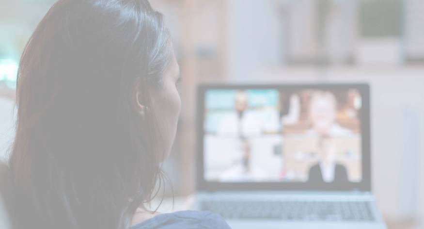 Lady having webinar sitting on sofa Lady participating at webinar sitting on sofa. Remote worker having online meeting, video conference consulting with colleagues on videocall and webcam chat working in front of laptop